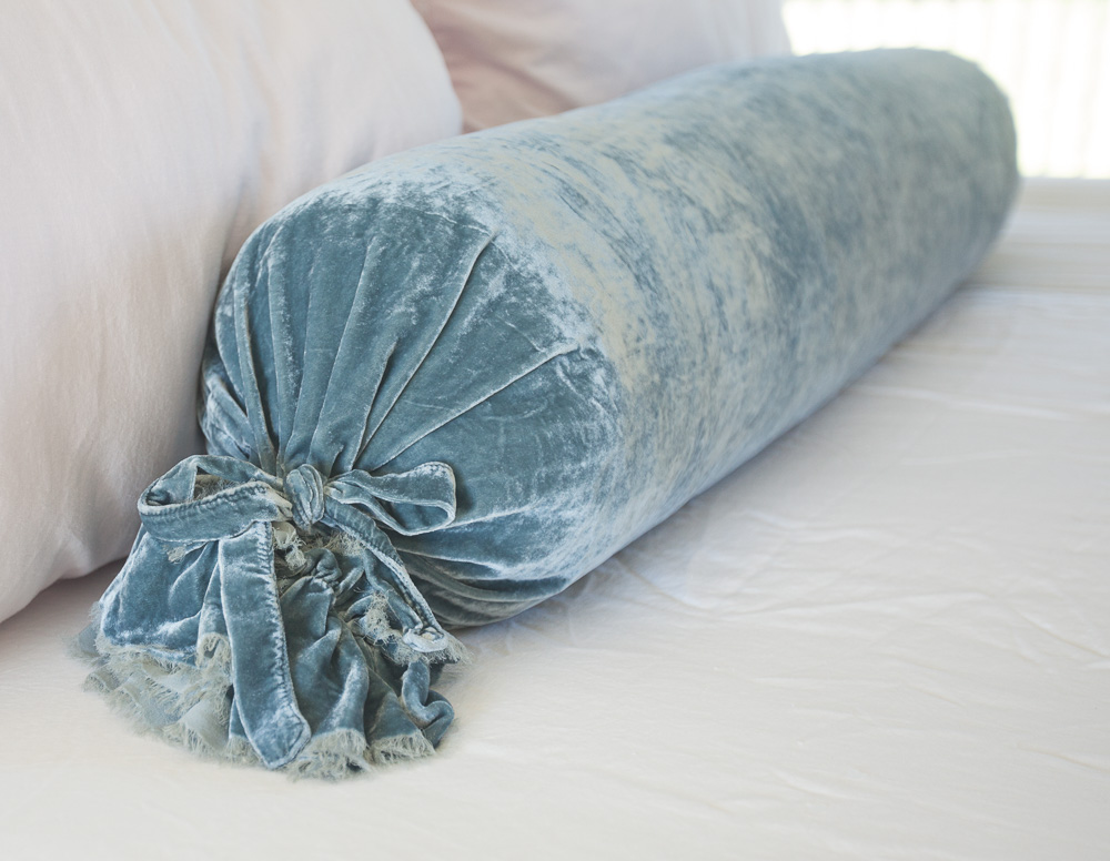 Blue velvet bolster pillow