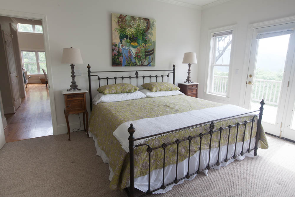 green bed mountain bedroom