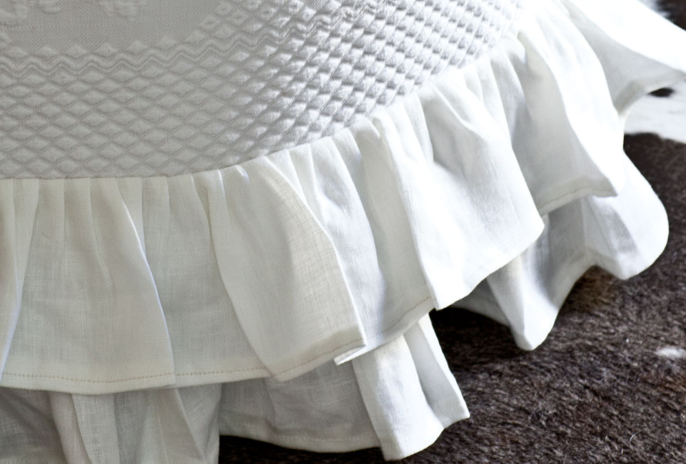 Slipcovered ottoman double ruffle