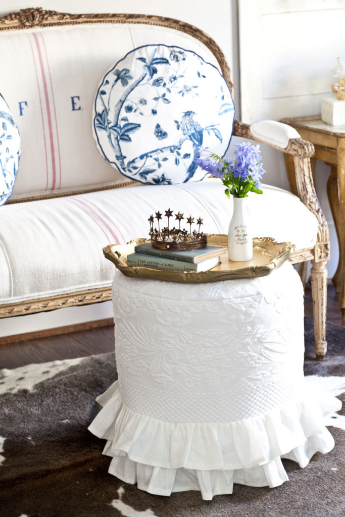 Slipcovered ottoman in white