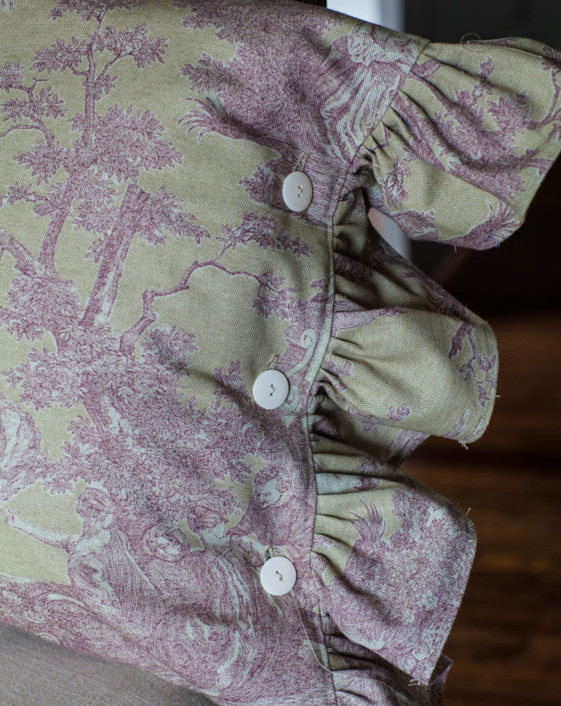 toile pillow detail