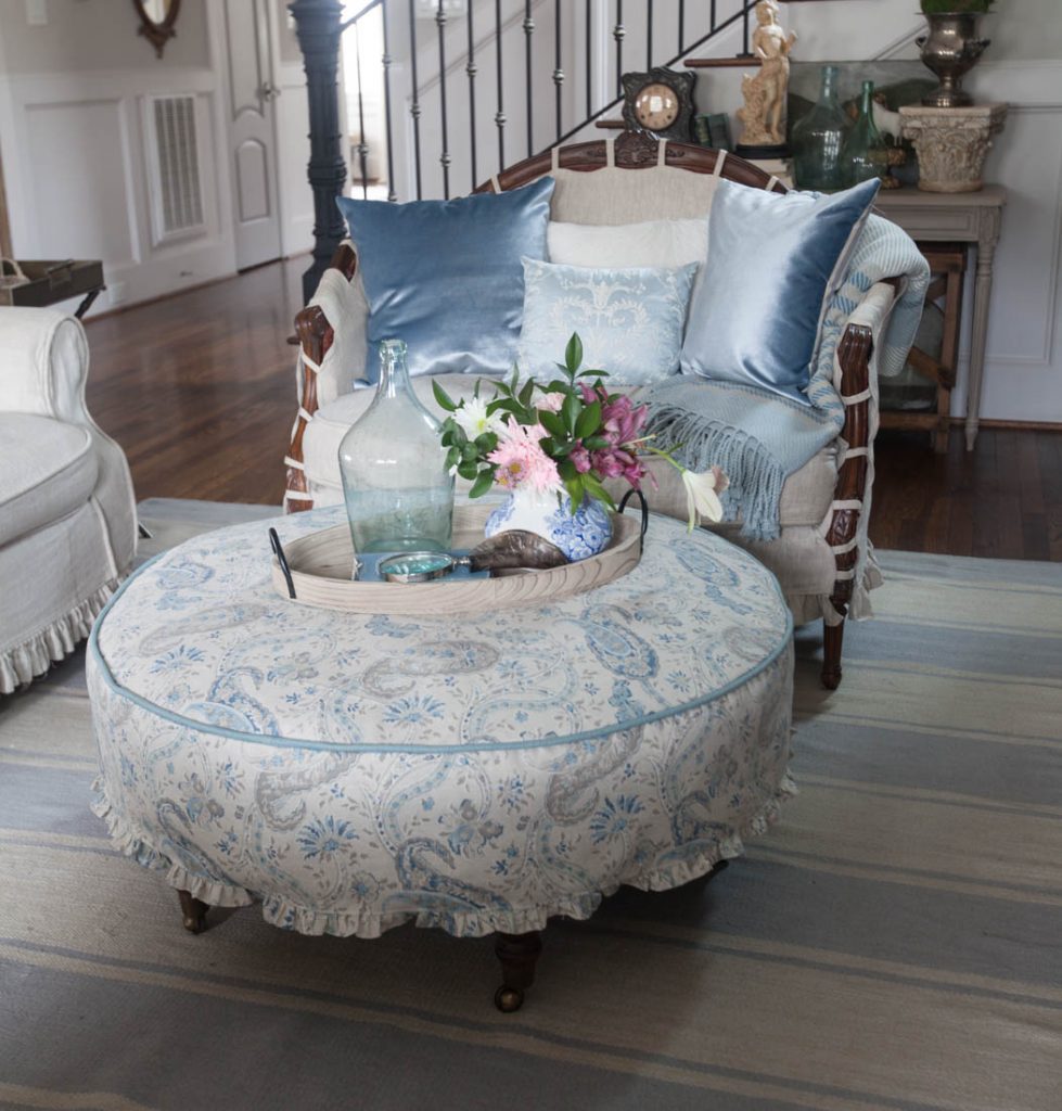 Blue ruffled slipcover and french chair