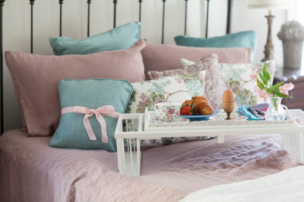 rose linen sheets and bed tray