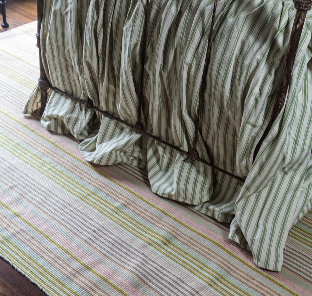 striped rug with green and pink