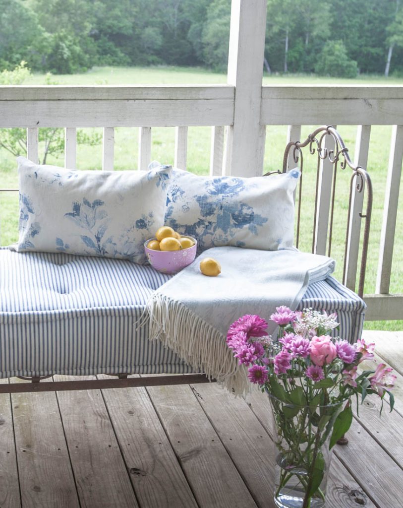 blue porch pillows and lemons